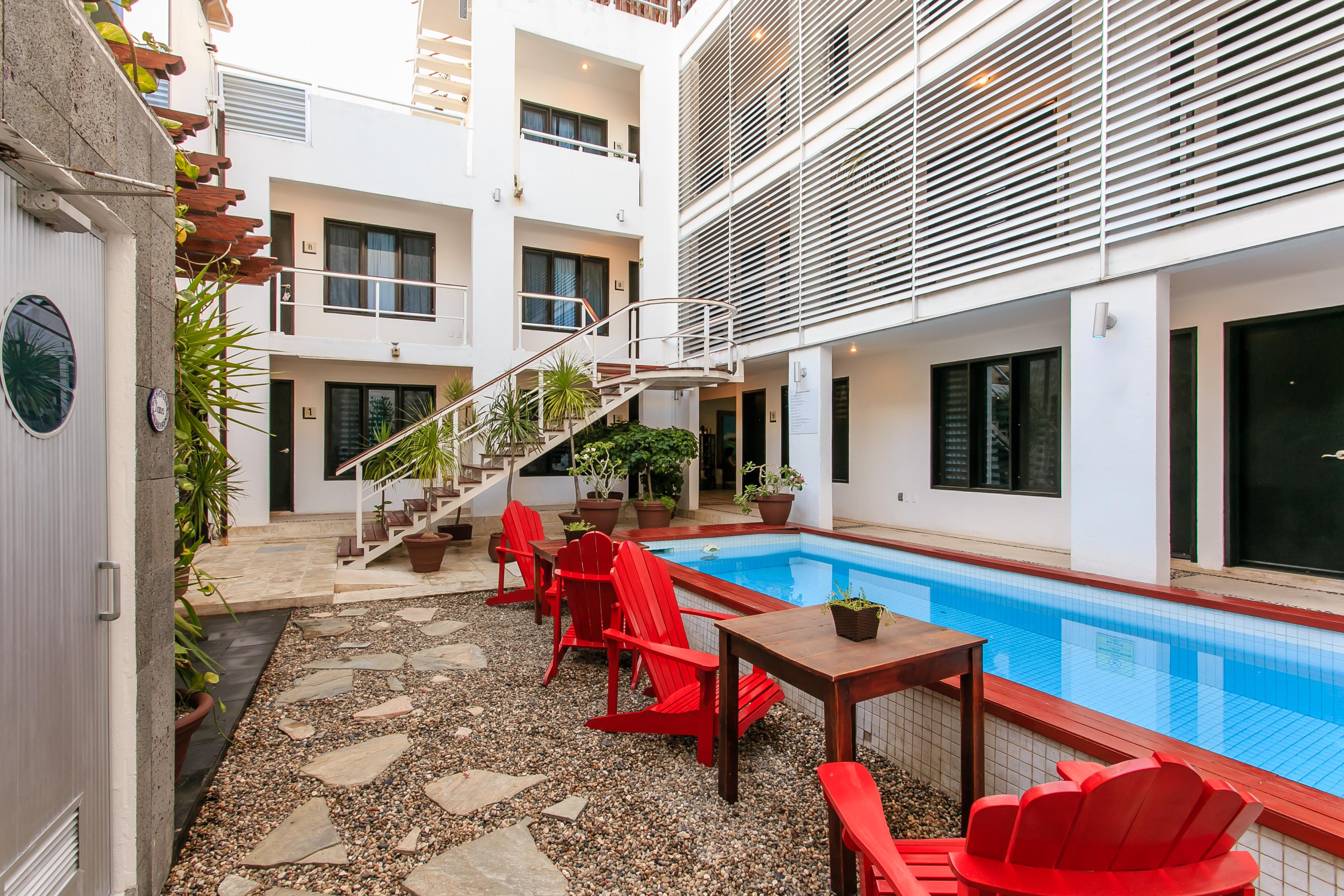 Casa Ticul Hotel Boutique - 5Th Ave (Adults Only) ปลายาเดลการ์เมน ภายนอก รูปภาพ The Hotel's courtyard