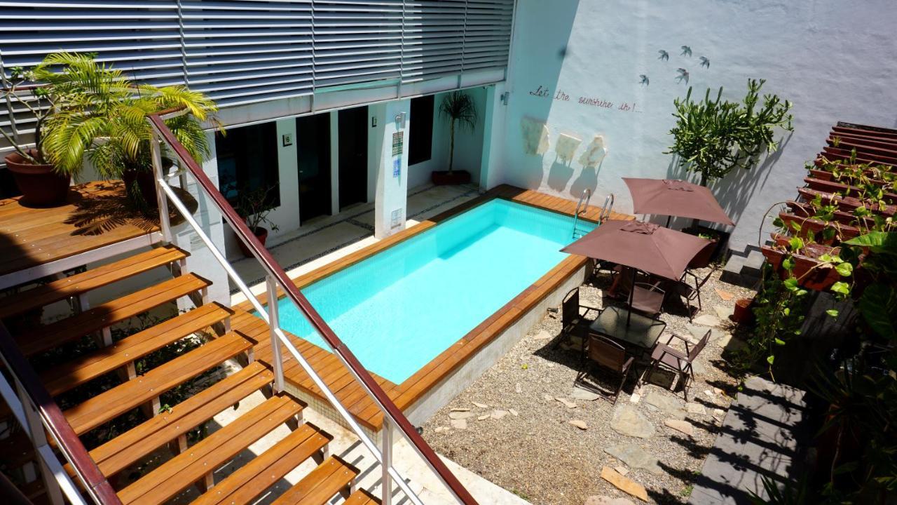 Casa Ticul Hotel Boutique - 5Th Ave (Adults Only) ปลายาเดลการ์เมน ภายนอก รูปภาพ A swimming pool in a courtyard