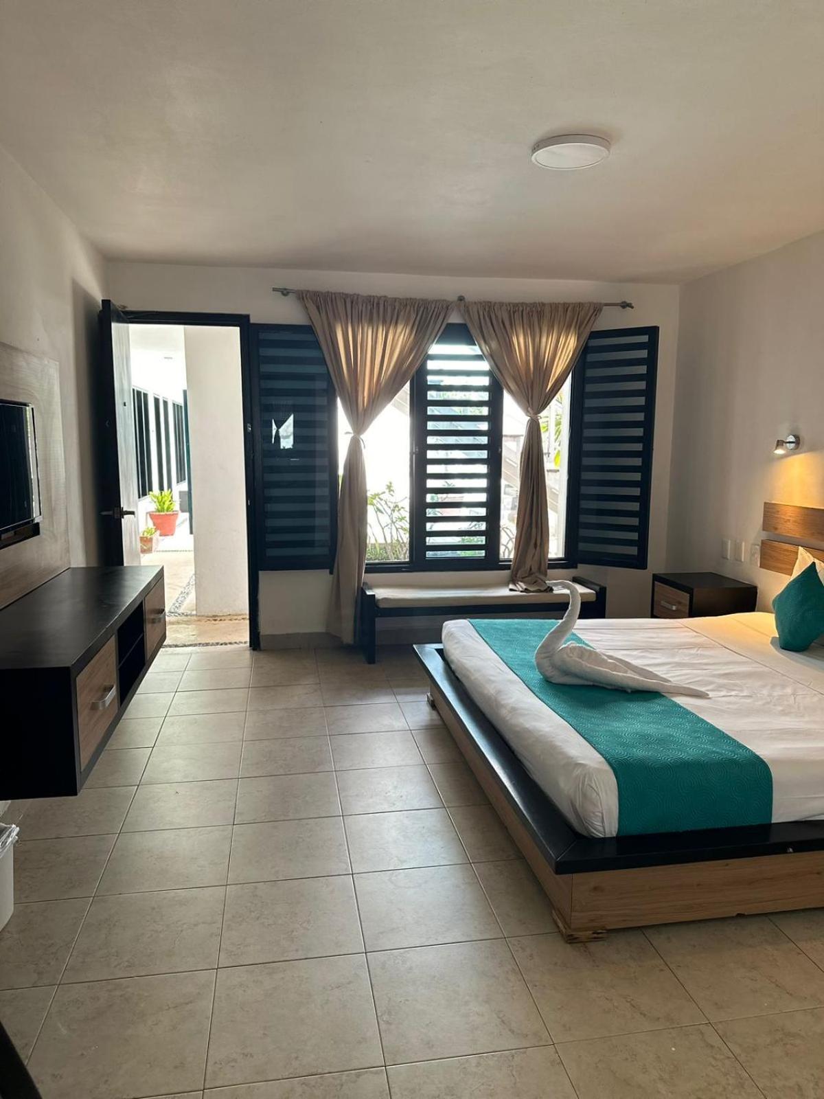 Casa Ticul Hotel Boutique - 5Th Ave (Adults Only) ปลายาเดลการ์เมน ภายนอก รูปภาพ A room at the hotel