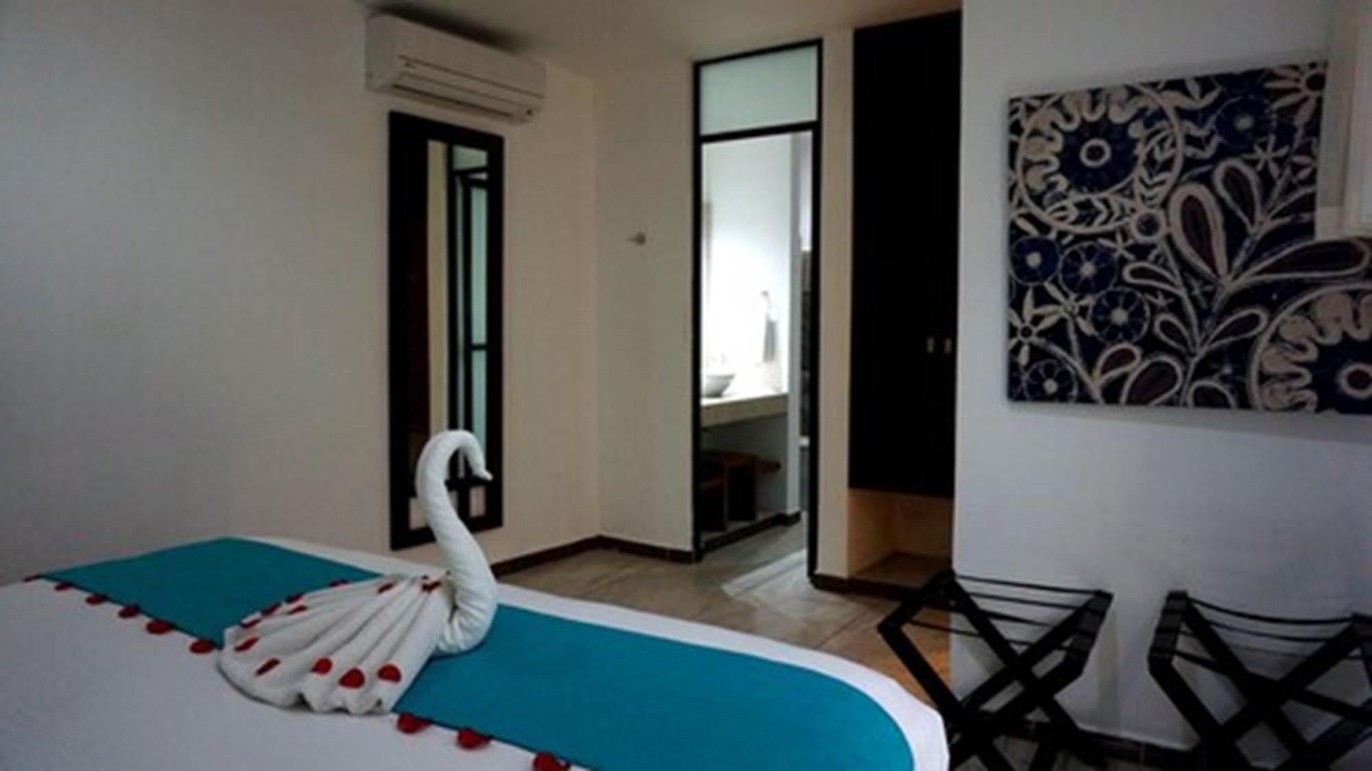 Casa Ticul Hotel Boutique - 5Th Ave (Adults Only) ปลายาเดลการ์เมน ภายนอก รูปภาพ A room at the hotel
